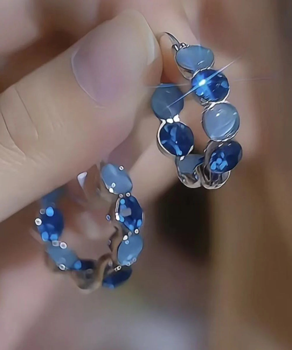 Boucles d'oreilles créoles pour femme style œil de chat 0
