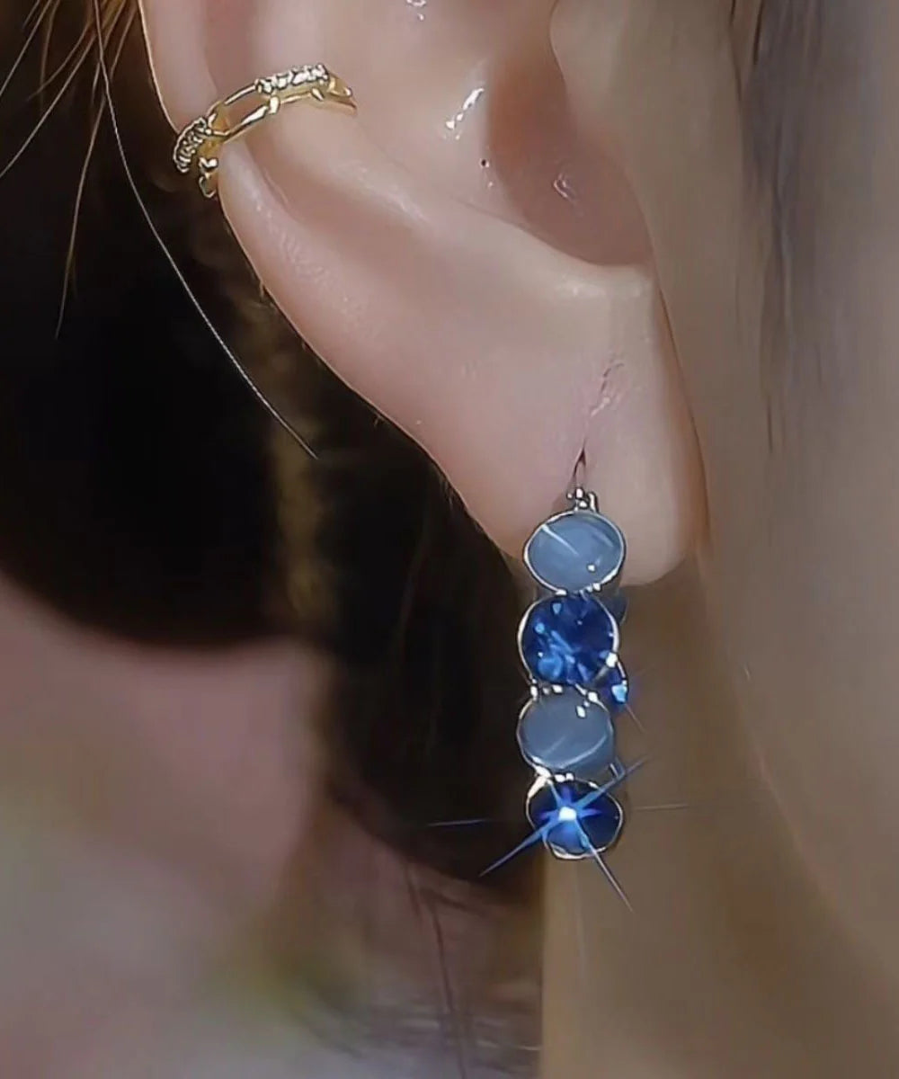 Boucles d'oreilles créoles pour femme style œil de chat 2