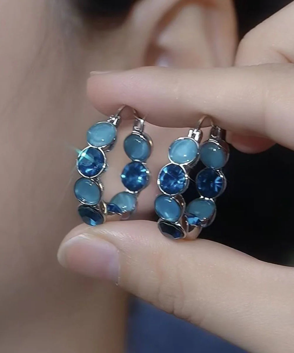 Boucles d'oreilles créoles pour femme style œil de chat 3
