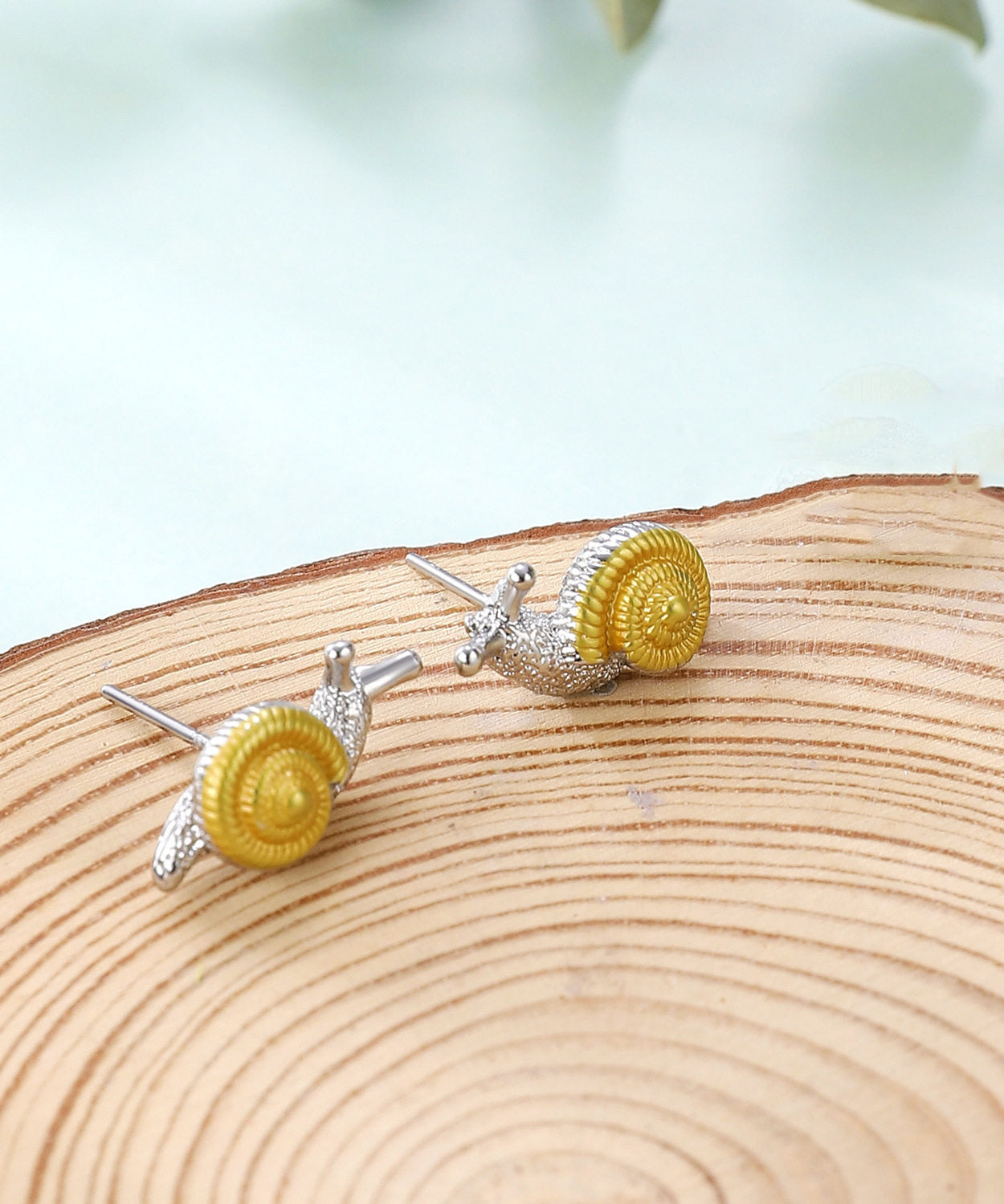 Boucles d'oreilles femme forme escargot design raffiné 1