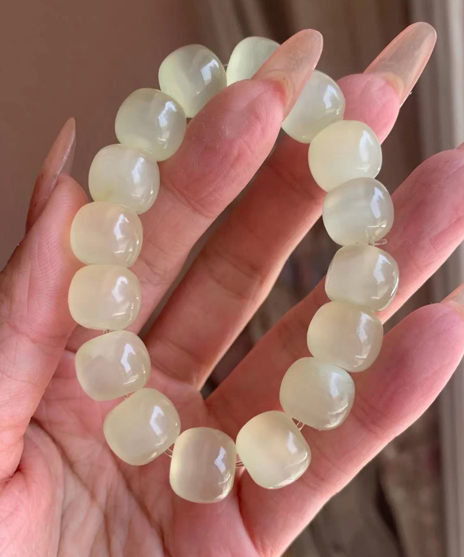 Bracelet Femme Perles Translucides Style Oeil de Chat 1