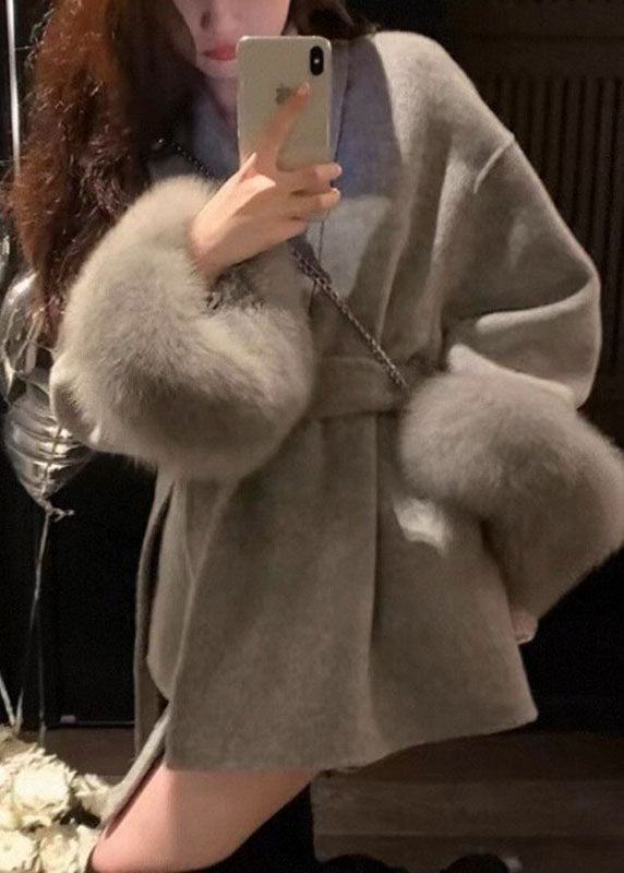 Manteau pour femme à col en V avec poches et ceinture à manches longues 1