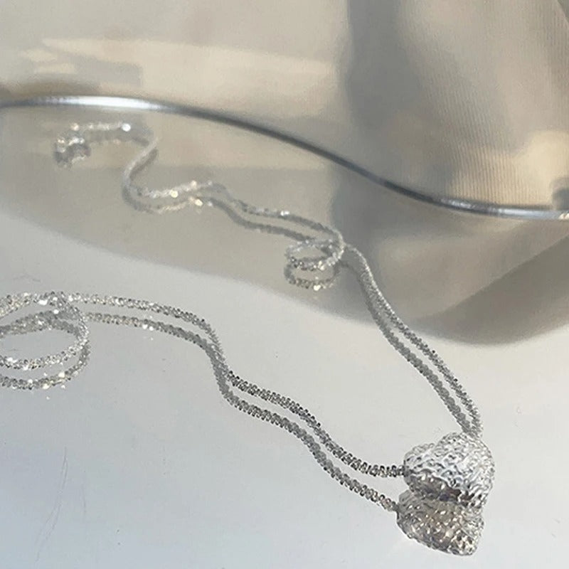Collier à pendentifs en forme de cœur