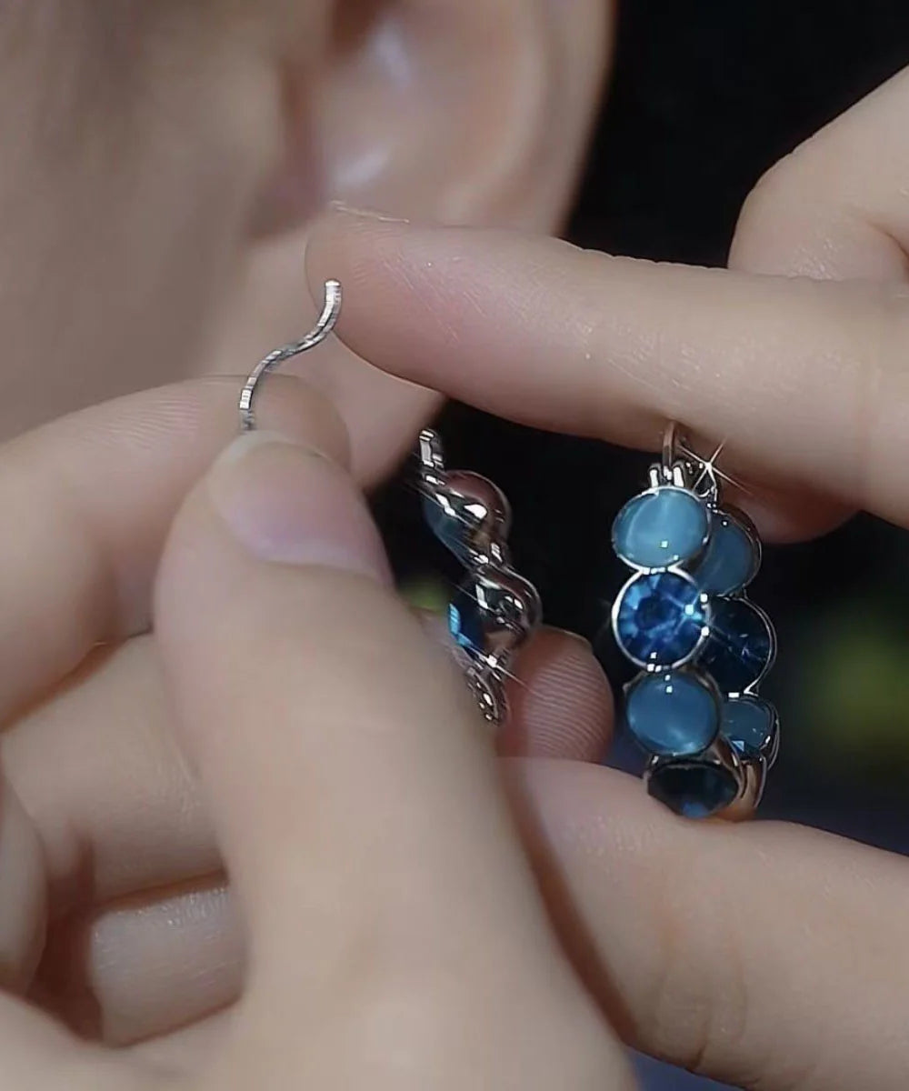Boucles d'oreilles créoles pour femme style œil de chat 4
