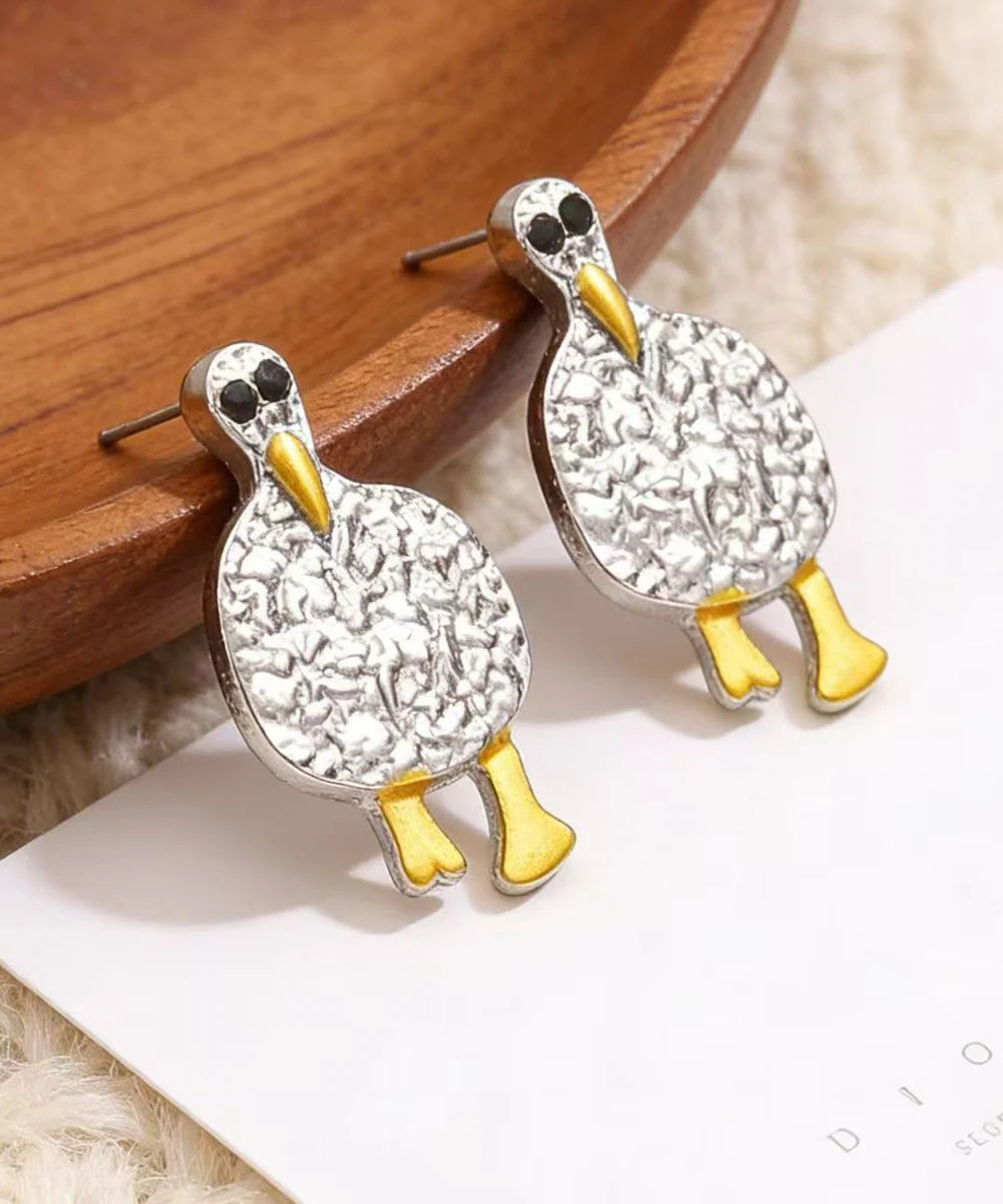 Boucles d'oreilles puces motif canard rétro pour femme 1
