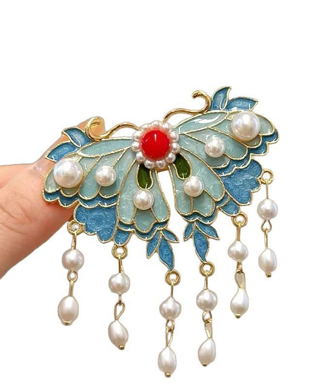 Épingle à cheveux papillon bleu avec perle et gland 4