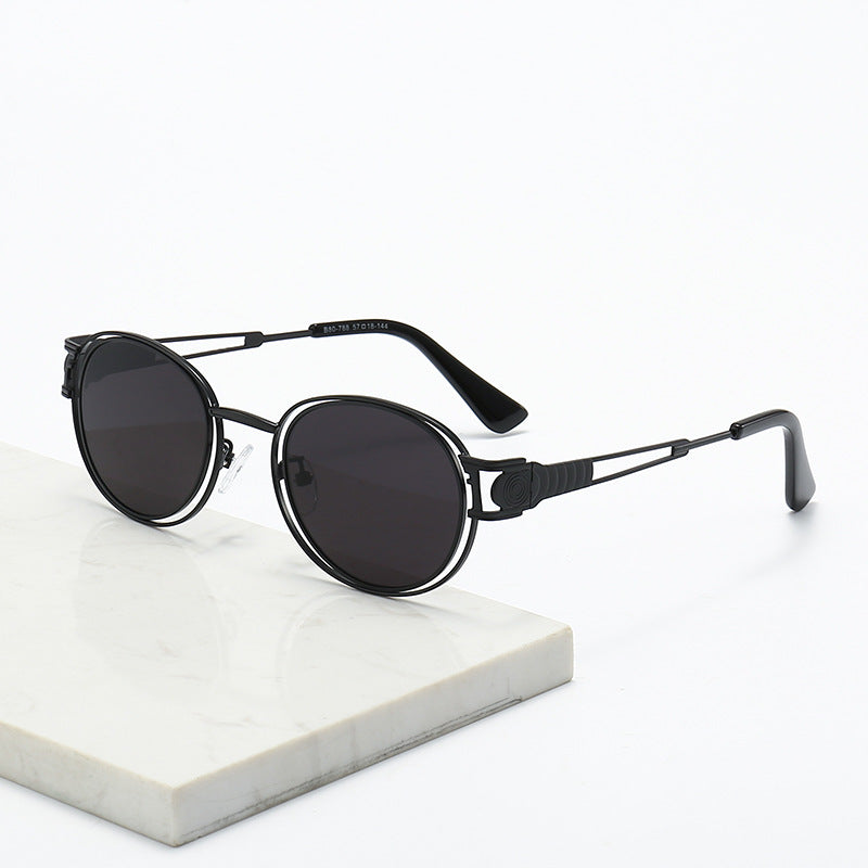 Lunette de Soleil Femme Monture Métallique Ronde Moderne 1