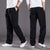 Pantalon Homme Coupe Décontractée en Tissu Doux avec Poches Arrière 3