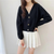 Cardigan en maille torsadée pour femmes