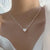 Collier à pendentifs en forme de cœur