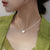 Collier à pendentifs en forme de cœur