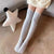 Chaussettes hautes en polaire corail