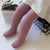 Collants en maille torsadée pour fille