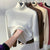 Pull à col roulé doublé de velours pour femmes
