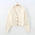 Cardigan en maille torsadée pour femmes