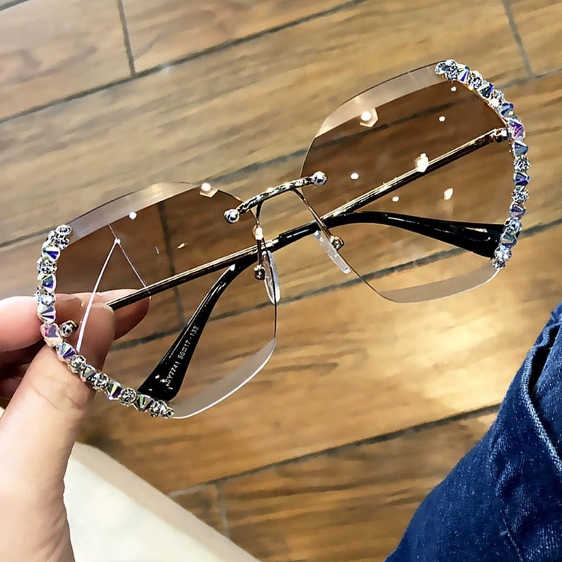 Lunettes de soleil sans monture avec strass