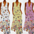 Robe longue sans manches à imprimé papillon