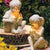 Enfants avec lucioles solaires Statues de jardin